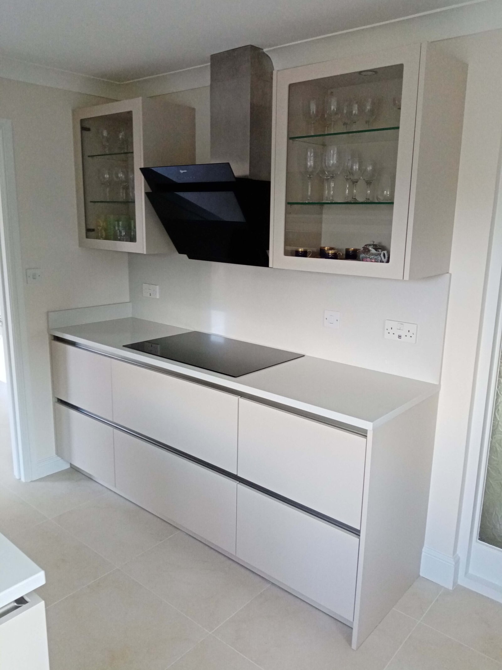 Modern handleless kitchen renovation completed by N. Patten
